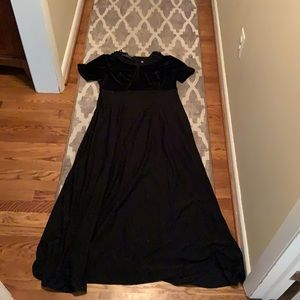 Full length black concert dress.